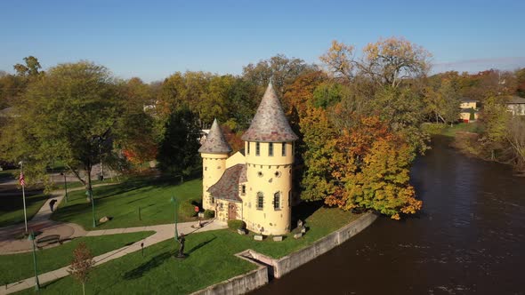 Curwood Castle in Owosso, Michigan with drone shot zooming out.