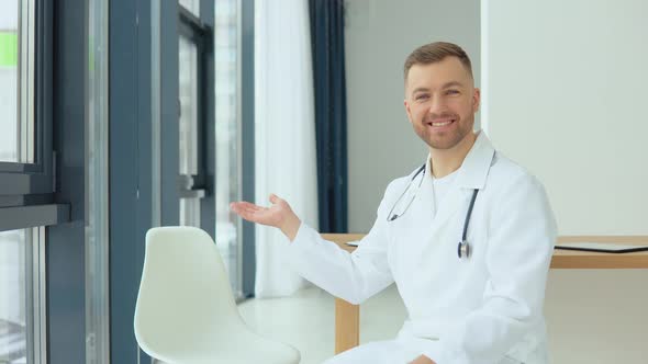 A Friendly Doctor Invites a Patient for a Consultation