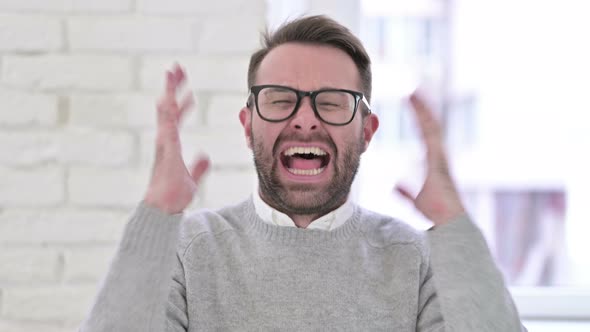 Portrait of Screaming Upset Creative Man Shouting Loud