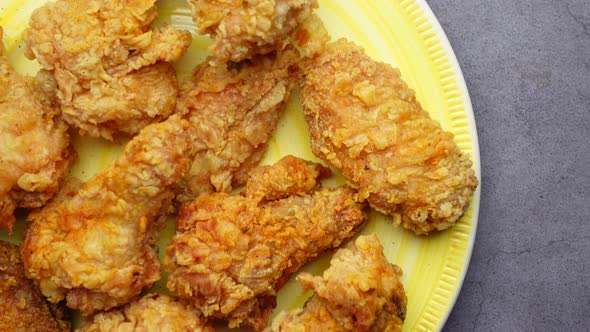 Crispy Fried Chicken Wings on a Plate Top View