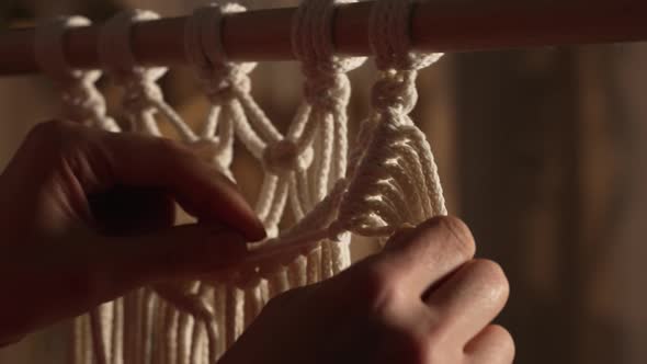 Women's Hands Weave Macrame in Boho Style