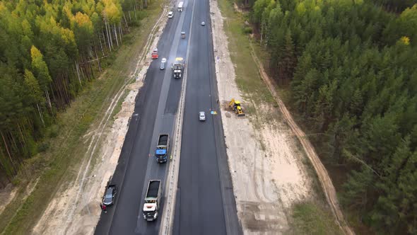 Extensive roadwork on a cloudy fall day on a scenic stretch of country freeway