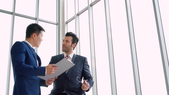 Business People Handshake with Friend at Office