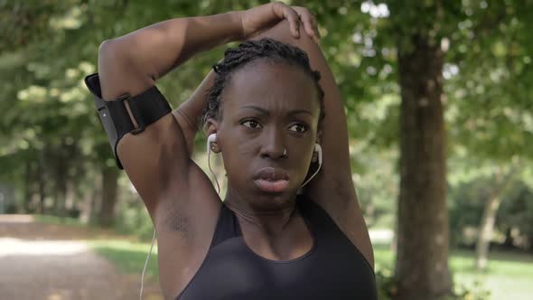 training,stretching,sport.beautiful African athlete doing stretching-slow motion