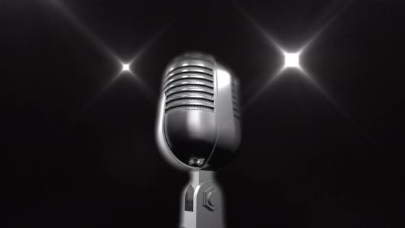 Vintage Microphone 360 Loop With Flares in the Background alt