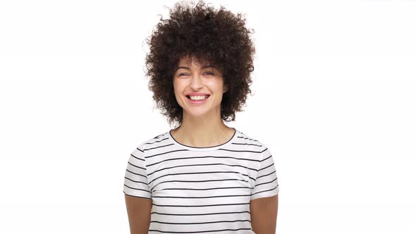 Portrait of Beautiful Young Woman Being Positive Smiling Broadly Showing Her White Teeth at Camera
