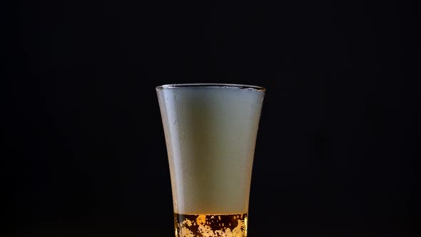Closeup of the rotating beer glass