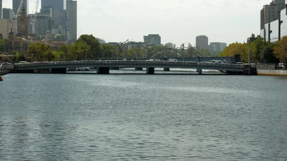 Melbourne Australia looking down the Yarra River. PAN UP SHOT.