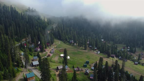 Misty Aerial View Of High Mountain Village