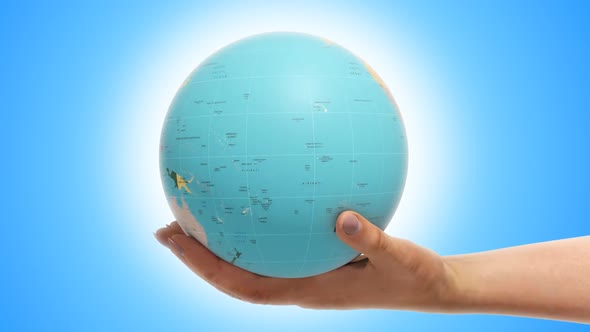 Globe With Countries On Hand