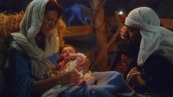 Joseph with Lamb Near Mary and Baby Jesus