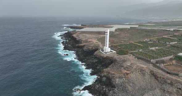 Lighthouse Look Out Tower Structure at Rocky Cliff Coast Atlantic Ocean Sea Line