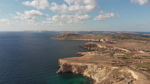 Aerial drone video from northern Malta near the Ghajn Znuber Tower.