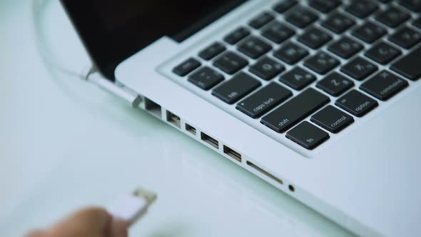 Hand Connecting Usb Hard Drive to Laptop, Modern Personal Computer Technology