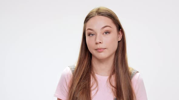 Sad Young Beautiful Girl Over Jittering White Background