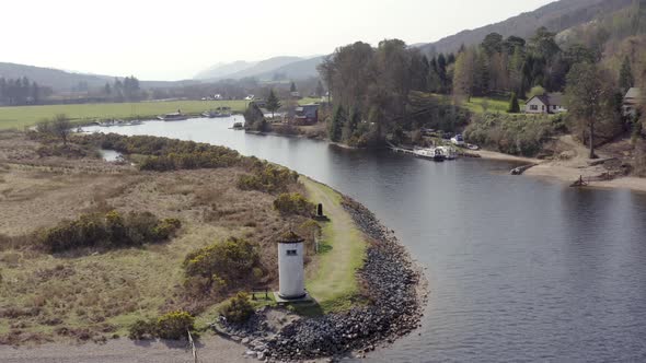 Head of a Loch in Scotland with a Small Lighthouse