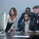 Group of Multiracial Business People Around the Conference Table Looking at Laptop Computer - VideoHive Item for Sale