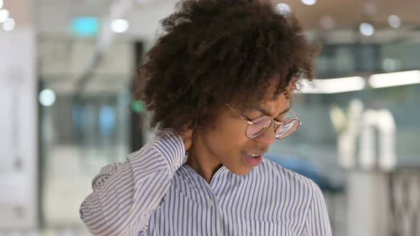 Tired African Businesswoman Having Neck Pain