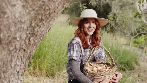 Girl with Basket Full of Chicken Eggs