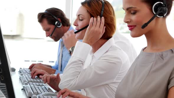 Happy Call Center Employees at Work