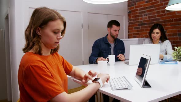 Female executive working at desk