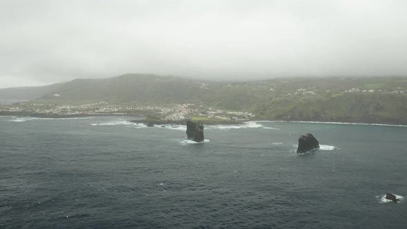Aerial view of the Azores coastline during stormy weather