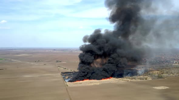 Burning Grass Field From Above