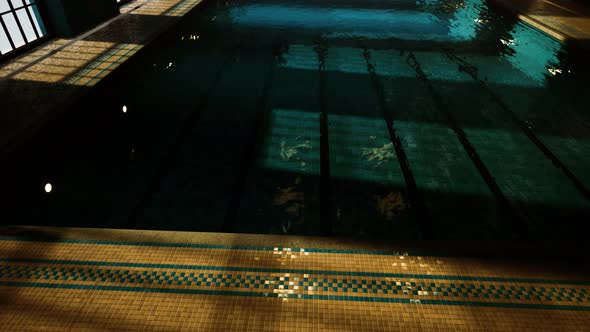 The View of an Empty Public Swimming Pool Indoors alt