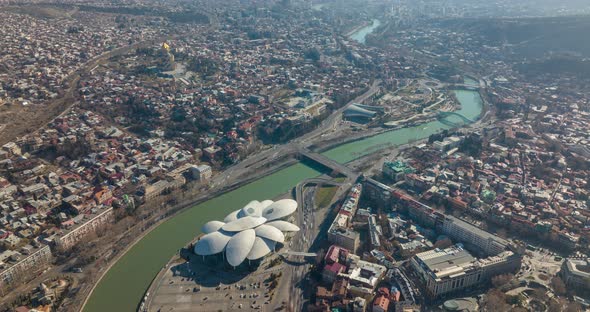 Aerial time lapse of Public service hall and Baratashvili bridge in the center of Tbilisi. Georgia