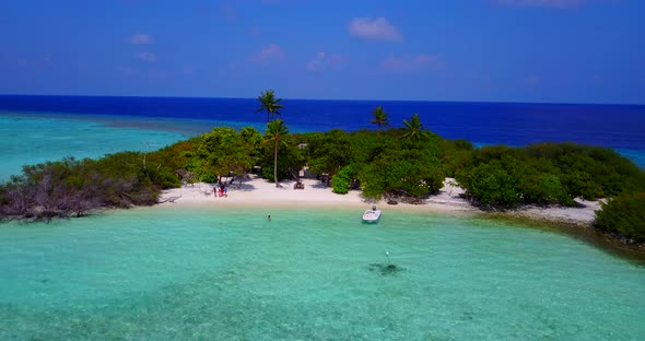 Luxury overhead island view of a summer white paradise sand beach and blue sea background in vibrant