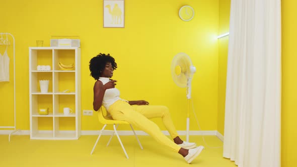 Woman Has Fun In Yellow Room