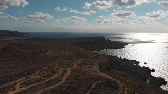 Aerial drone video from northern Malta near the Ghajn Znuber Tower.