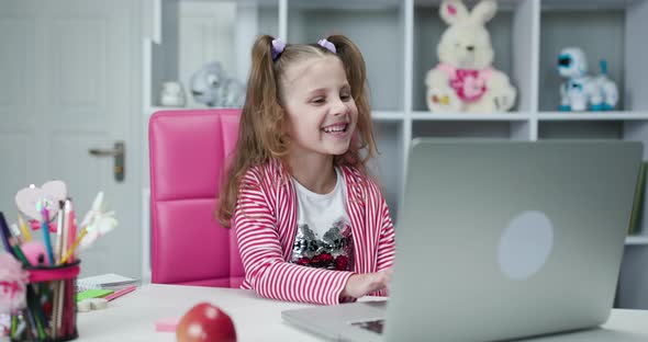 Girl Calling on Laptop Distance Learning at Home