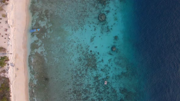 Beautiful coral reefs,rocks and pattern underwater of Gili Meno Island.Aerial top down shot.