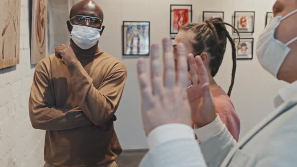 People in Masks on Exhibition