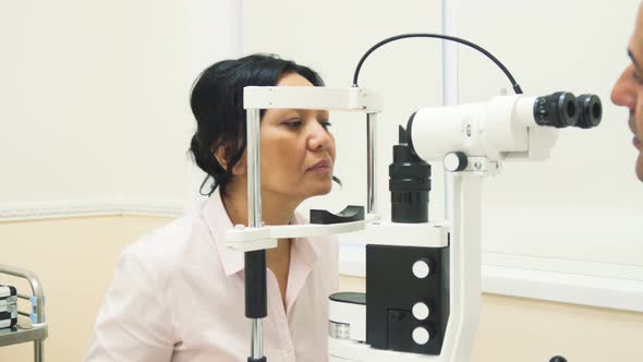 The Patient Puts His Head on a Special Eye Check Device