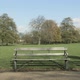 Couple holding hands, woman walking across benches - VideoHive Item for Sale
