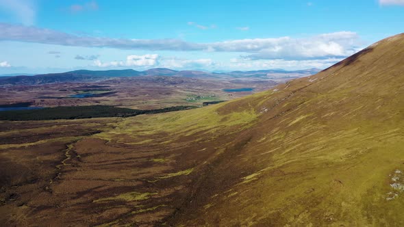 Aerial View of the Beautiful Coast at Malin Beg with Slieve League in the Background in County