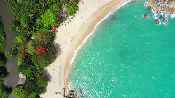 Peaceful secluded sandy beach on the Thailand coast with turquoise seawater, Vibrant tropical backgr