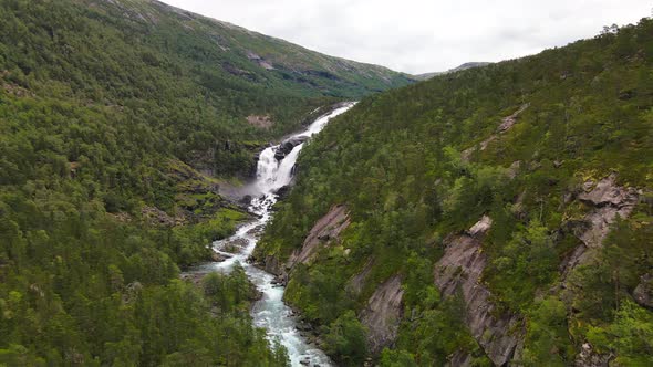 Nyastolfossen falls, waterfall in Husedalen valley, Kinsarvik, Norway