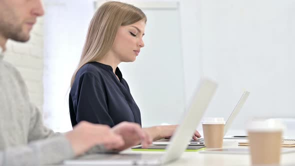 Ambitious Creative Woman Showing Thumbs Up in Office