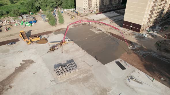 Aerial View  Road Construction Site and a Big Pump for Concrete Pouring Road