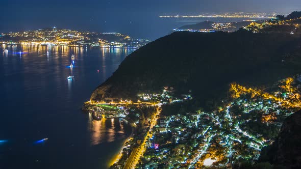 Night Timelapse View of the Mediterranean Coastline of the Town of Eze Village on the French Riviera