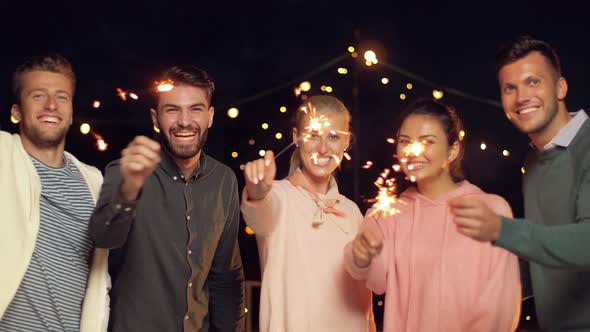 Happy Friends with Sparklers at Rooftop Party 39