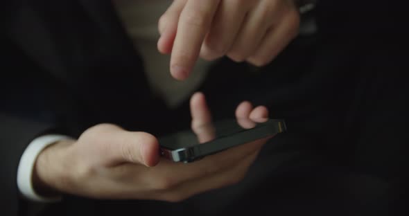 Close Up Businessman Black Suit Using His Smartphone