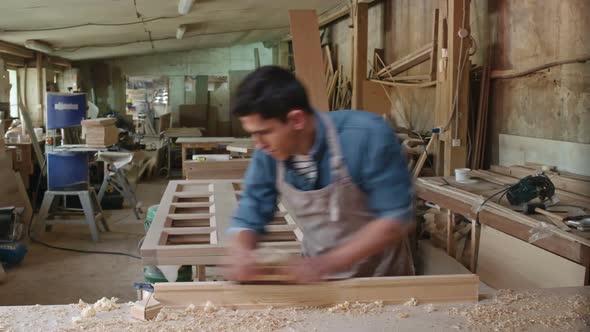 Carpenter Working with Wood