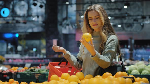 Caucasian Woman Consumer Female Shopper Girl Buyer with Shopping Basket at Grocery Store in