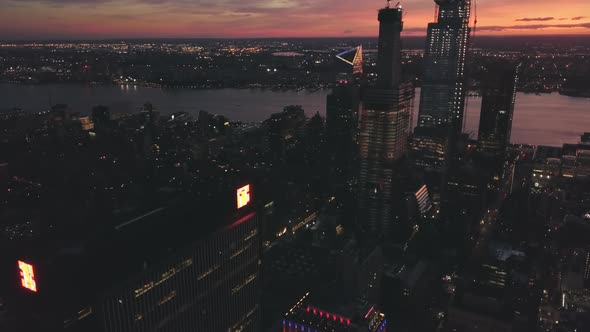 AERIAL Manhattan Drone Flight at Night with Glowing City Light in New York City