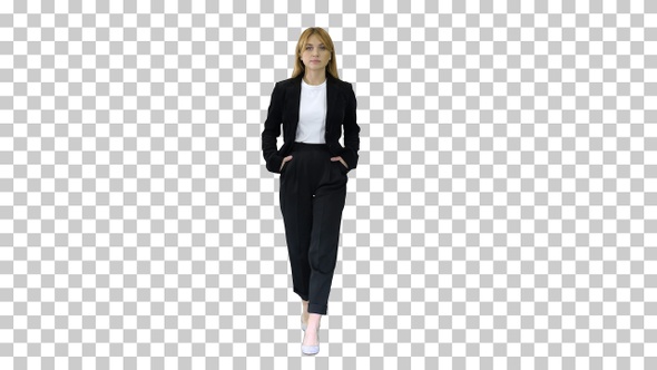 Walking businesswoman with hands in pockets, Alpha Channel