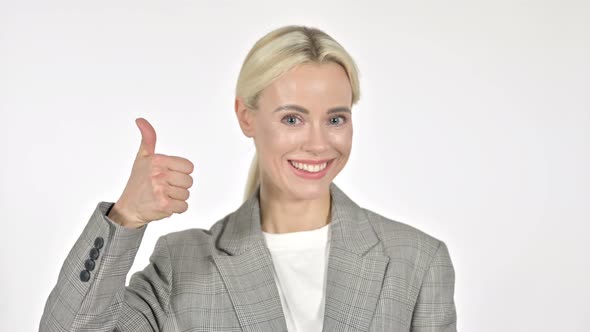 Businesswoman Gesturing Thumbs Up on White Background